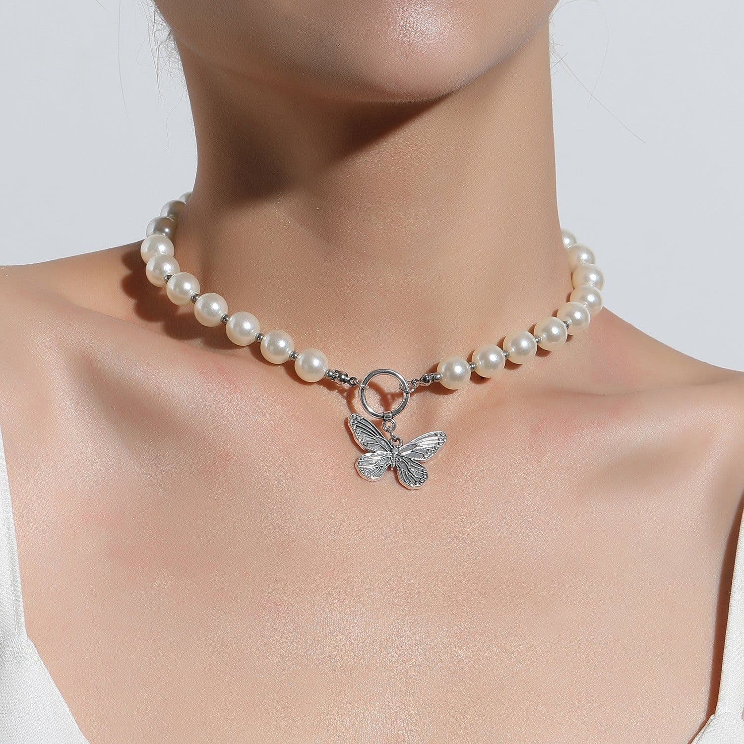 image-European and American cross-border jewelry Short retro metal butterfly pendant necklace for women Fashionable personality popular pearl necklace