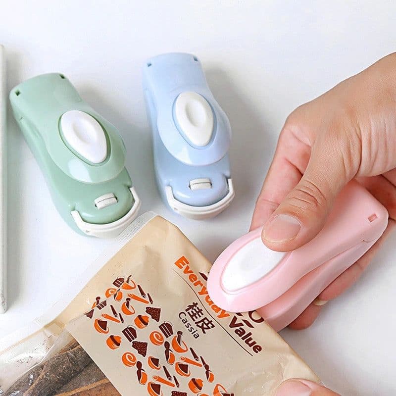 image-Candy color portable mini sealing machine snack plastic bag sealing machine household small hand pressure heat sealing machine wholesale