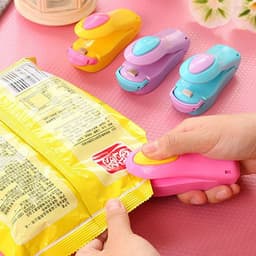 image-Candy color portable mini sealing machine snack plastic bag sealing machine household small hand pressure heat sealing machine wholesale