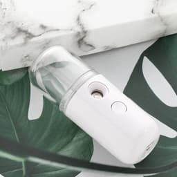 image-Wholesale Nano Spray Hydrating Meter Mini Sprayer Handheld Portable USB Rechargeable Hydrating Sprayer Humidifier