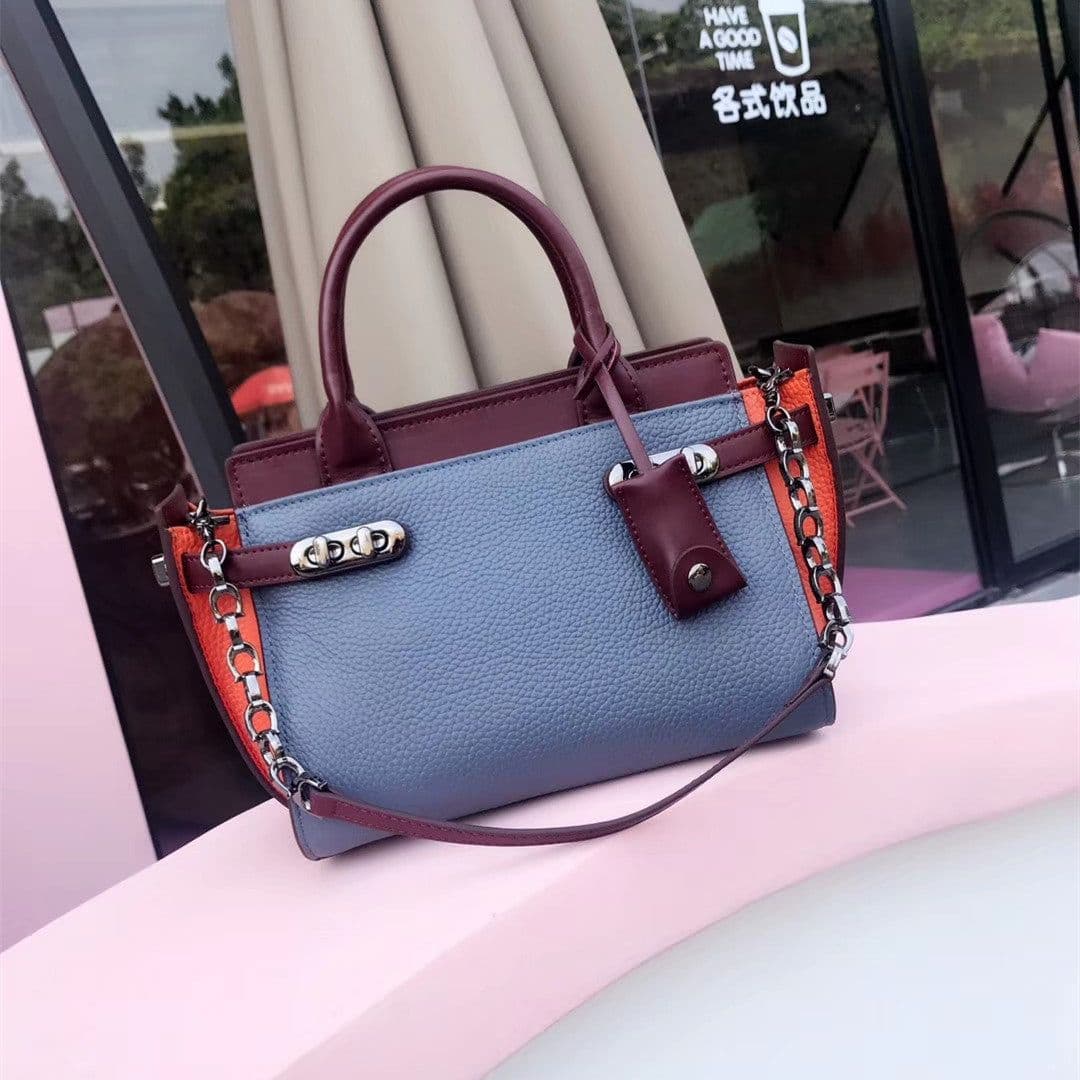 image-Leather women's handbags 2022 new European and American big-name wing bags, large bags, one-shoulder messenger bags