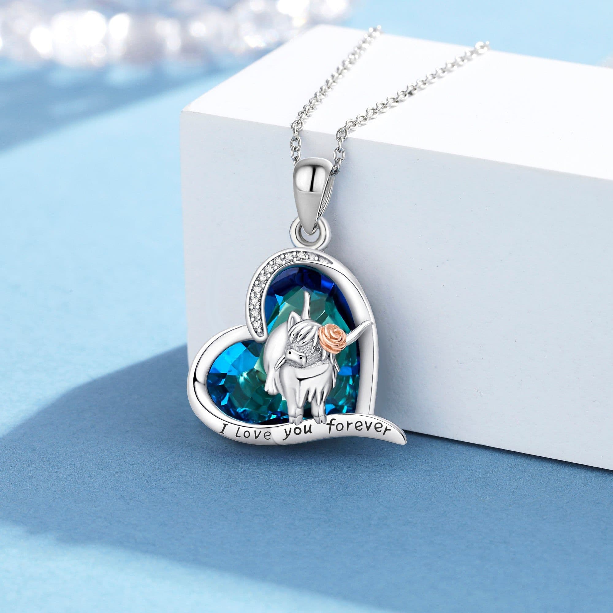 image-925 Sterling Silver Highland Cow Blue Crystal Heart Cow Pendant Necklace