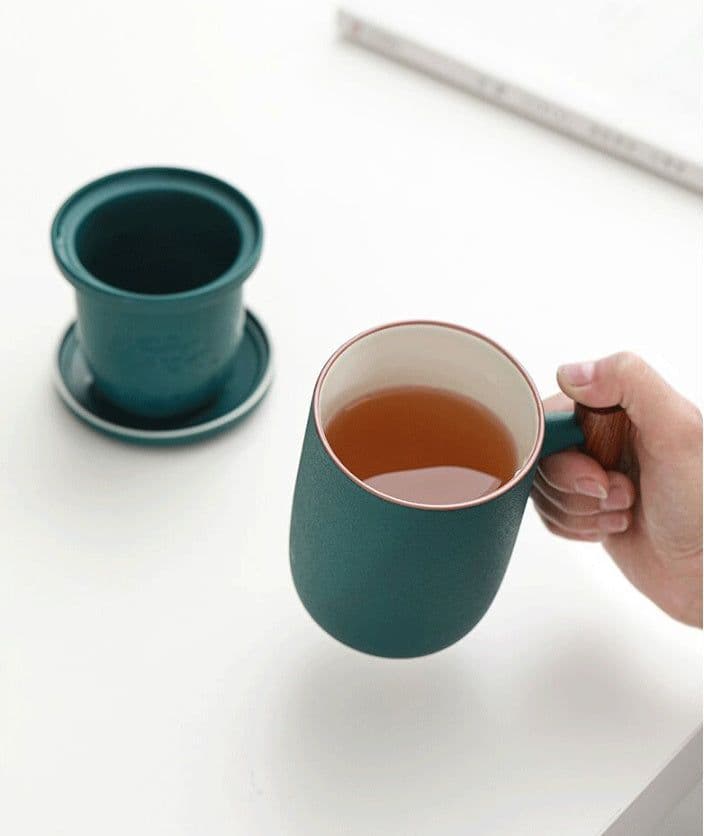 image-Household Tea Cup With Lid Tea Water Separation Filter Cup Creative Wooden Handle Water Cup Ceramic Office Cup