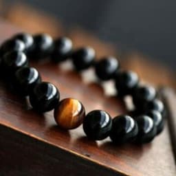 image-Natural Black Onyx With Stone Tiger Eyes Energy Bracelet