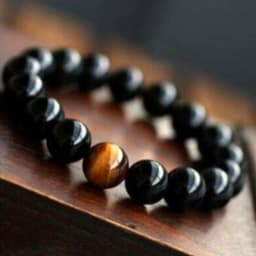 image-Natural Black Onyx With Stone Tiger Eyes Energy Bracelet