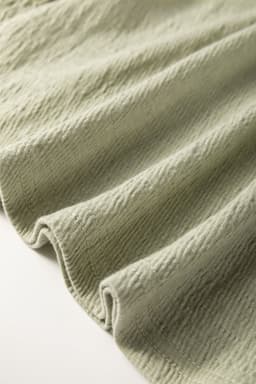 image-Laurel Green Textured Blouse - Round Neck Half Sleeve