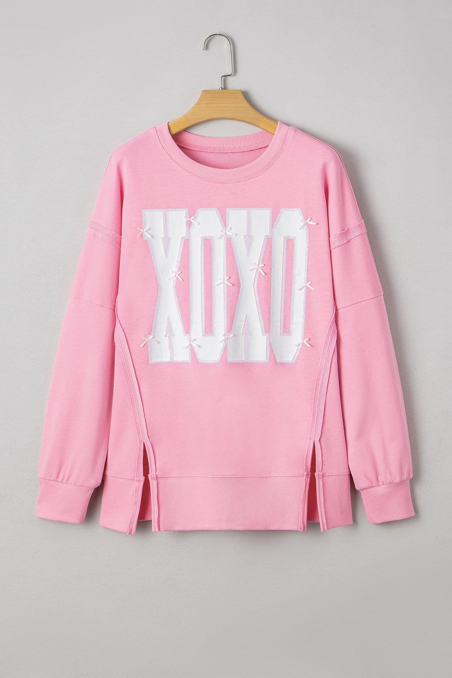 image-Pink Bow Sequin XOXO Letter Graphic Exposed Seam Baggy Sweatshirt