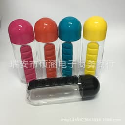 image-Creative with medicine box cup with seven-day portable medicine box Two in one outdoor carrying water bottle Pill cup