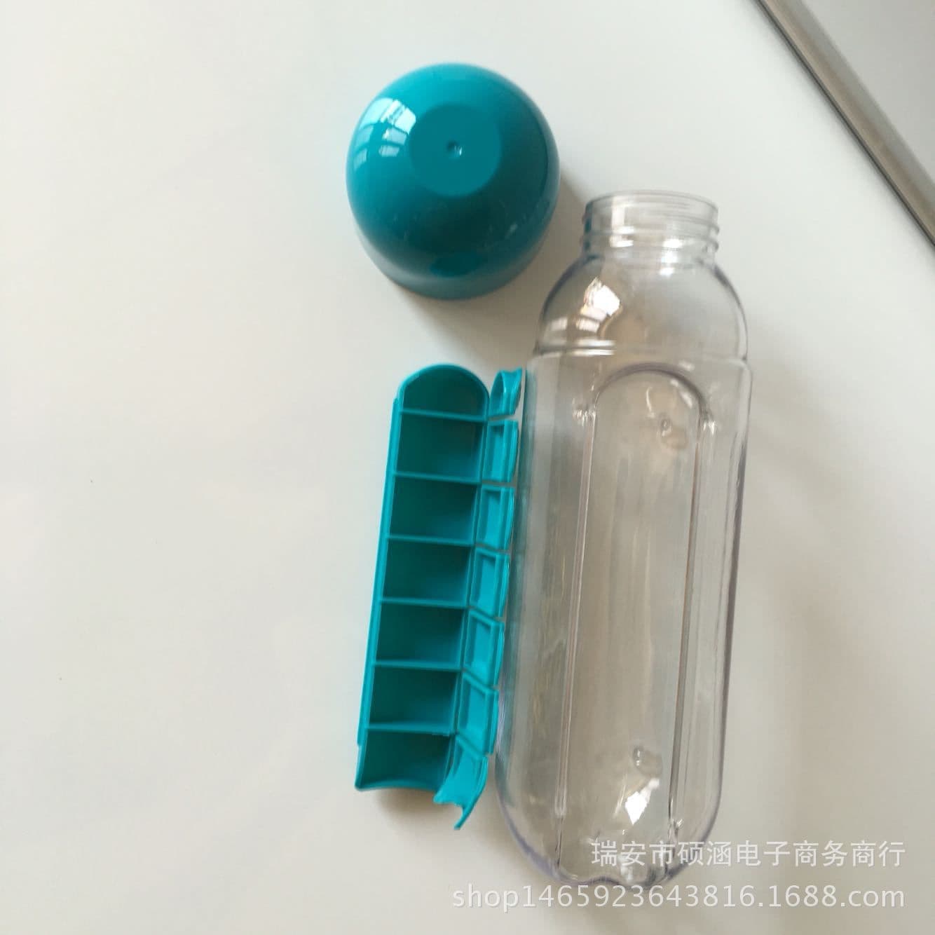 image-Creative with medicine box cup with seven-day portable medicine box Two in one outdoor carrying water bottle Pill cup