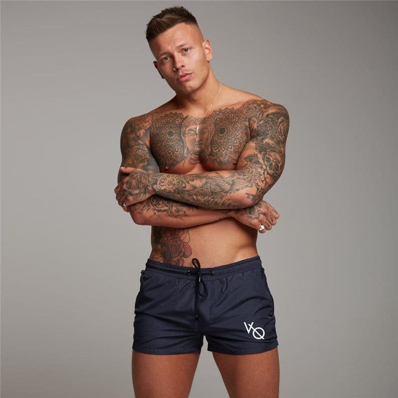image-New Mens Sexy Swimsuit Swimwear Men Swimming Shorts Men Briefs Beach Shorts Sports Suits Surf Board Shorts Men Swim Trunks