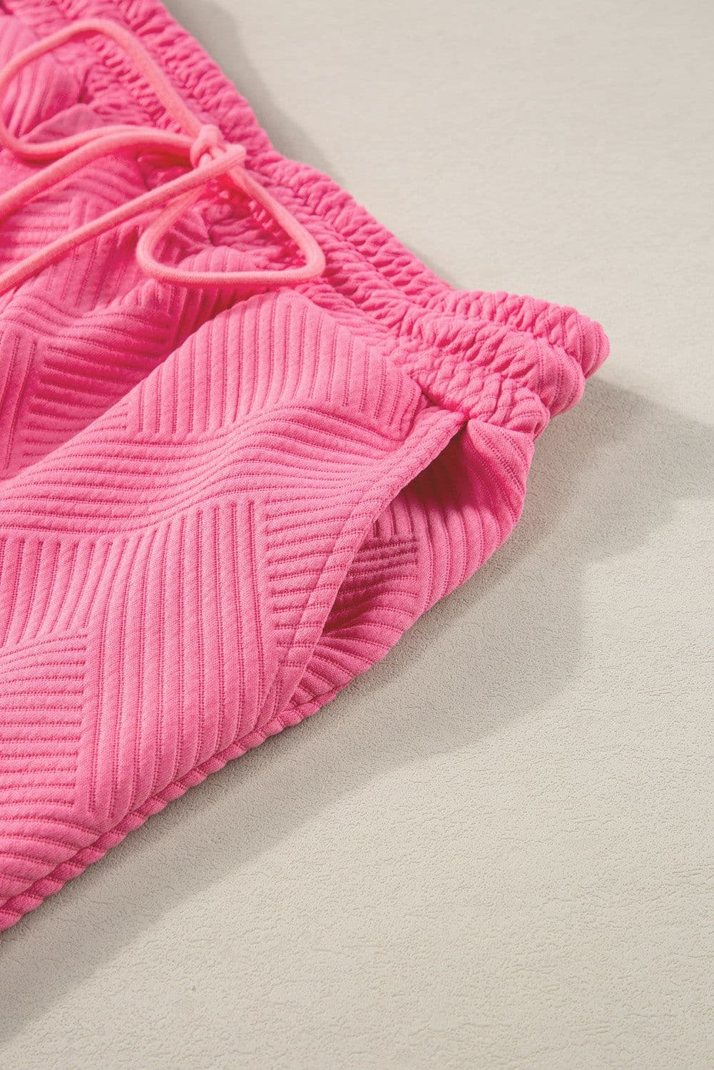 image-Strawberry Pink Textured Loose Fit T Shirt and Drawstring Pants Set