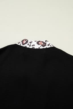 image-Black Dolman Half Sleeve Leopard Patchwork V Neck Blouse