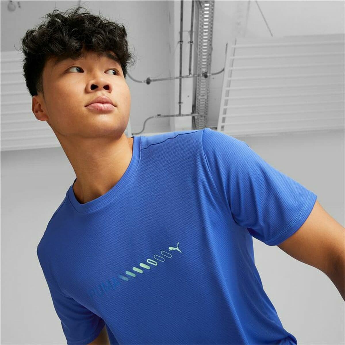 image-Men’s Short Sleeve T-Shirt Puma Run Favorite Logo Blue