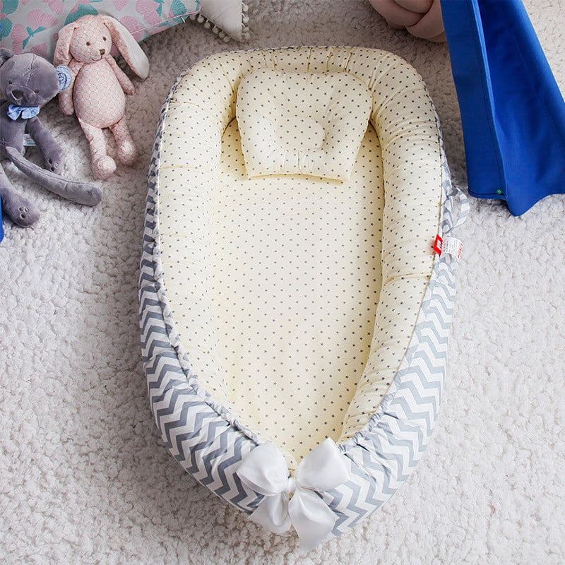 image-Cross-border folding removable and washable pressure-proof crib mid-bed bionic full detachable baby pillow travel crib