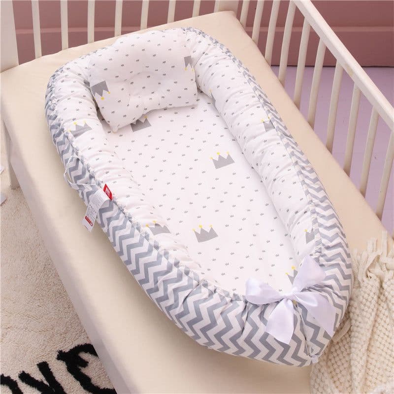 image-Cross-border folding removable and washable pressure-proof crib mid-bed bionic full detachable baby pillow travel crib