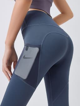 image-Yoga pants women's tight-fitting hip leggings quick-drying high-waist stretch mesh side pockets running sports fitness pants