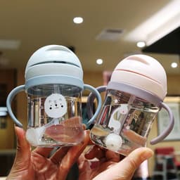 image-Cartoon children's plastic cup with graduated straw cup anti-choking baby handle water bottle resistant to falling and not leaking drinking cup