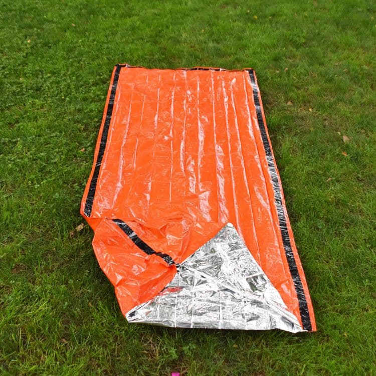 image-Cross-border supply of new customized PE sleeping bag, thermal insulation, waterproof and sunscreen silent camping outdoor orange emergency sleeping bag