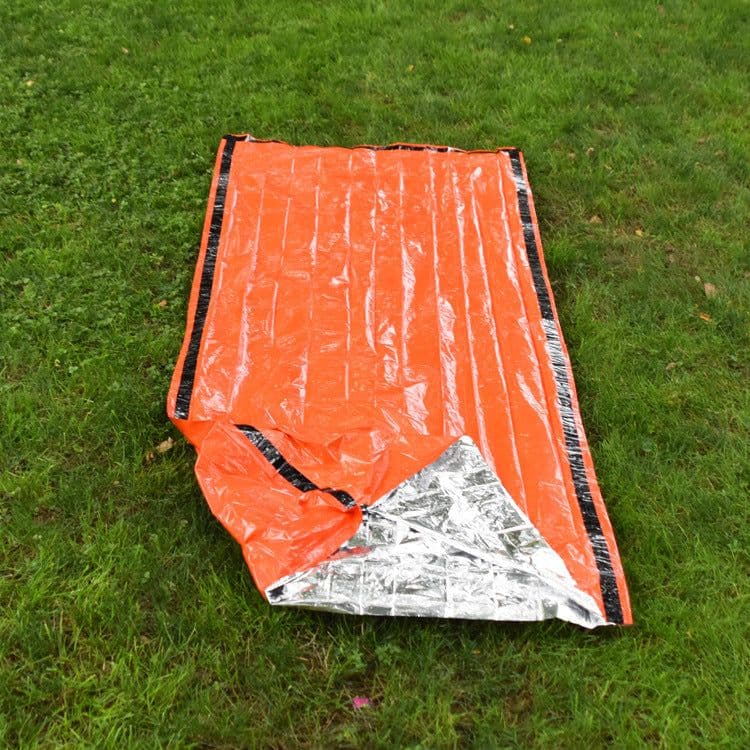 image-Cross-border supply of new customized PE sleeping bag, thermal insulation, waterproof and sunscreen silent camping outdoor orange emergency sleeping bag