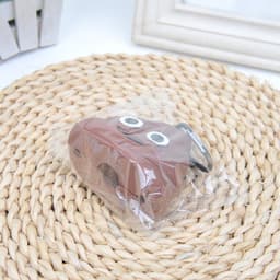 image-Pet garbage bag dispenser for cats and dogs to go out portable soft silicone dog poop bag poop-shaped storage box