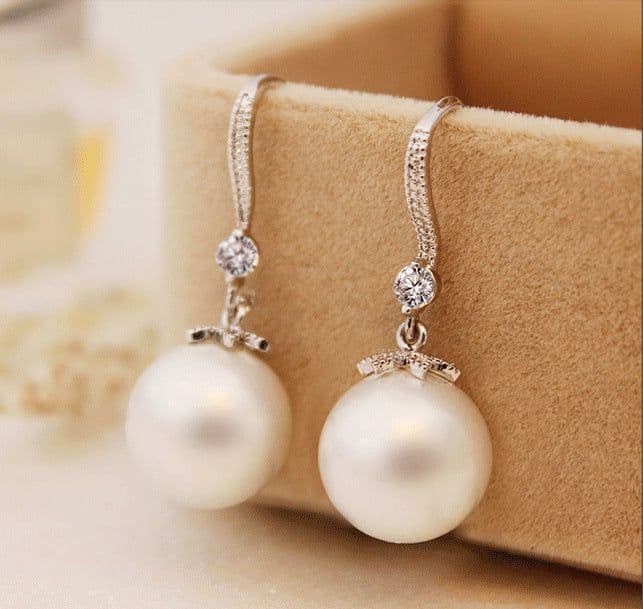 image-Korean temperament net red imitation pearl earrings female simple earrings European and American earrings ear jewelry wholesale