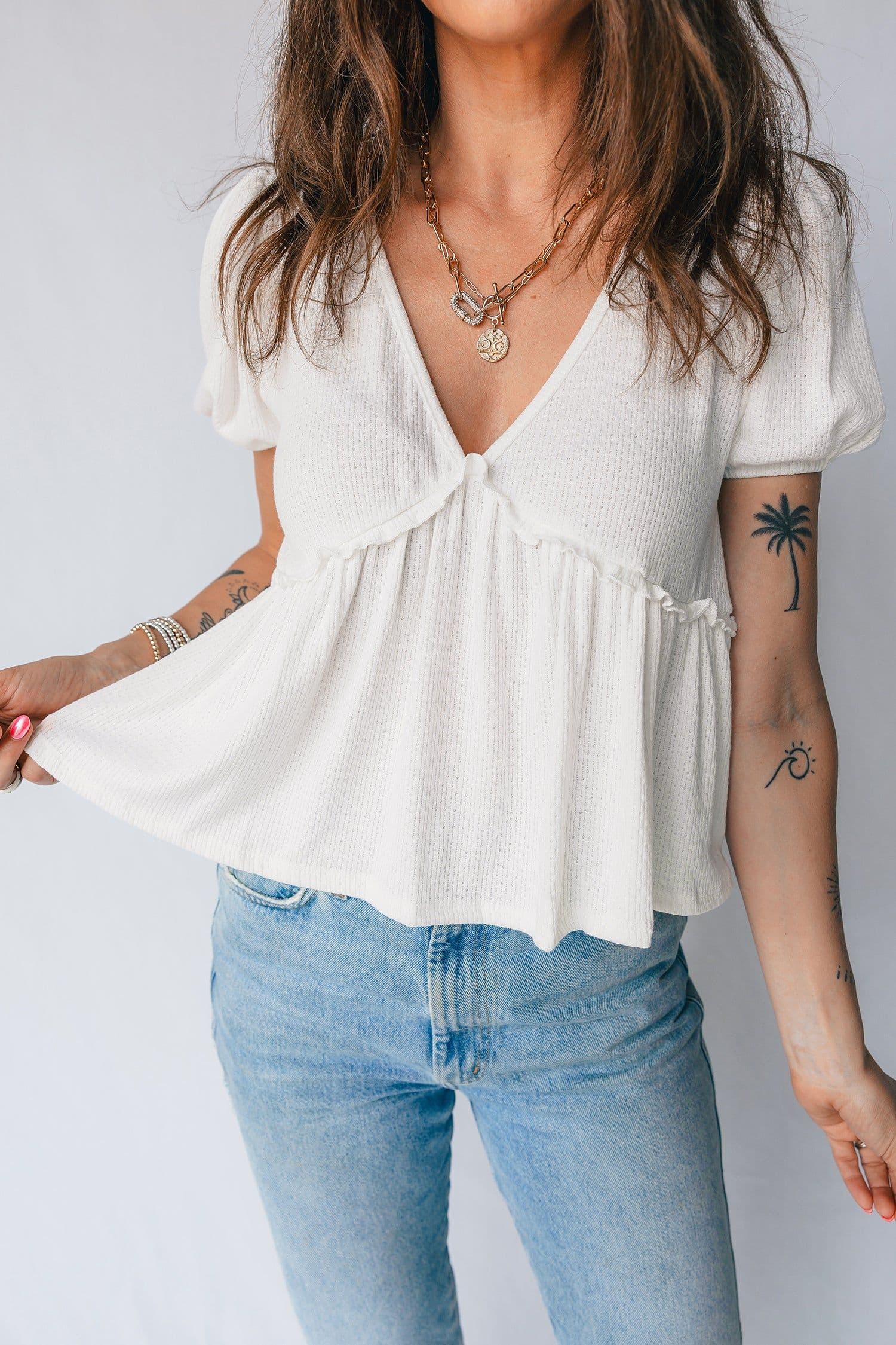 image-White Textured Knit V Neck Short Bubble Sleeve Peplum Top