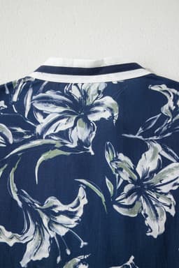 image-Blue Floral Print Short Puff Sleeve Striped Trim V Neck Blouse