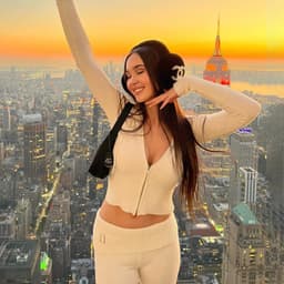 image-European and American cross-border 2023 new knitted hooded suit women's fashionable and sexy high-waisted long-sleeved trousers two-piece set