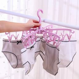 image-3600 Rotating Sock Drying Rack with 24 Clips - Space-Saving & Portable