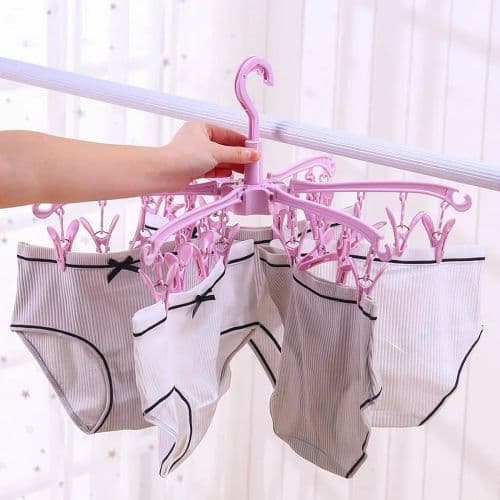 image-3600 Rotating Sock Drying Rack with 24 Clips - Space-Saving & Portable
