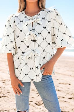 image-White Bowknot Blouse Bubble Sleeve Front Knots