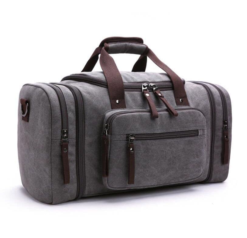 image-Cross-border Korean version of large-capacity luggage bag fashion leisure travel bag trend outdoor Messenger portable canvas travel bag