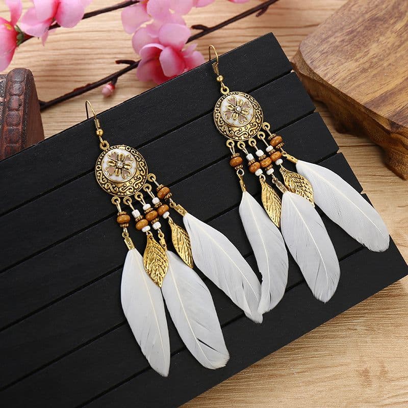 image-Factory Wholesale Ethnic Style Vintage Earrings Bohemian Vacation Style Antique Alloy Carved Feather Tassel Earrings