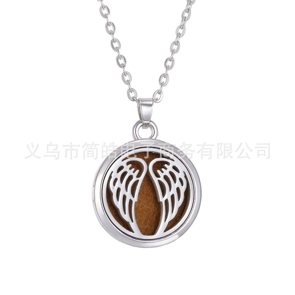 image-Tree of Life Alloy + Amazon AliExpress Aromatherapy Pendant Couple Can Open Round Hollow Perfume Box