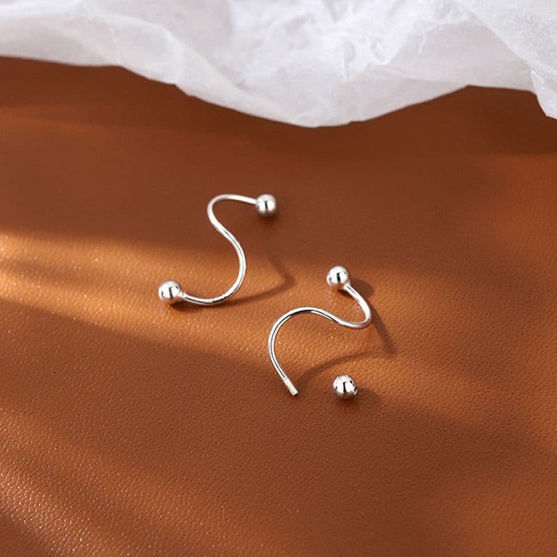 image-Curved spiral earrings, personality, cool style, rotating ear bone nails, no-removal earrings for sleeping, round bead screw-buckle earrings