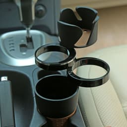 image-Multifunctional car water cup holder car storage box cross-border magic drink holder change coin box cup storage box