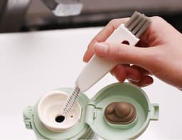 image-Kitchen Three-in-one Cleaning Brush Water Cup Lid Cup