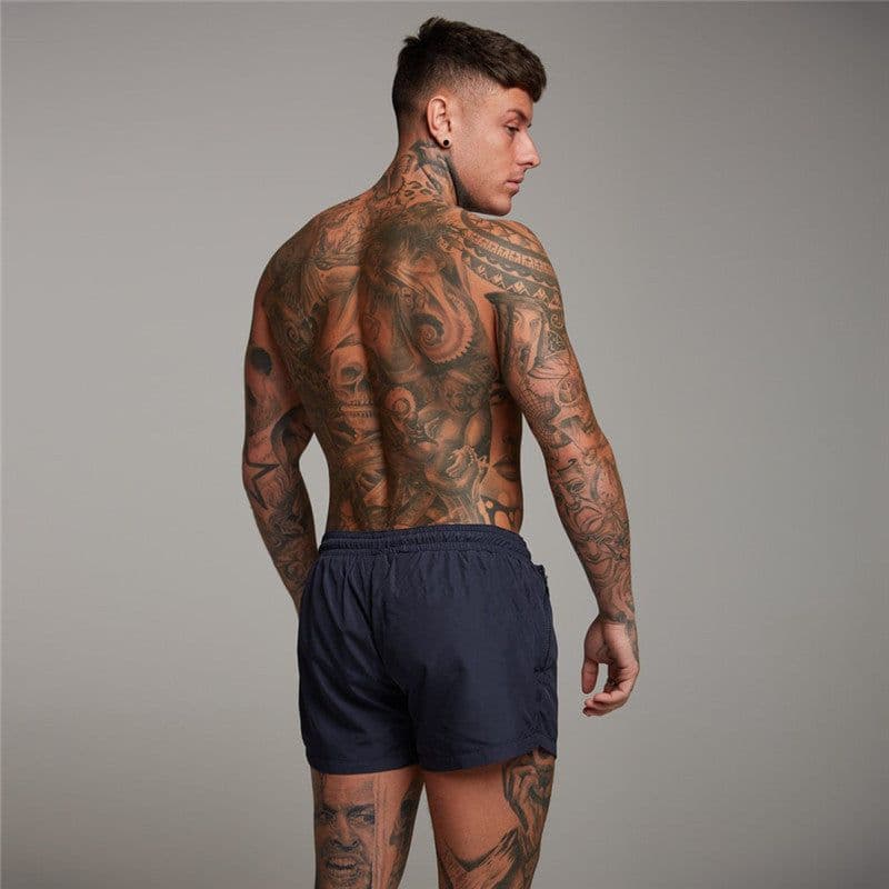 image-New Mens Sexy Swimsuit Swimwear Men Swimming Shorts Men Briefs Beach Shorts Sports Suits Surf Board Shorts Men Swim Trunks