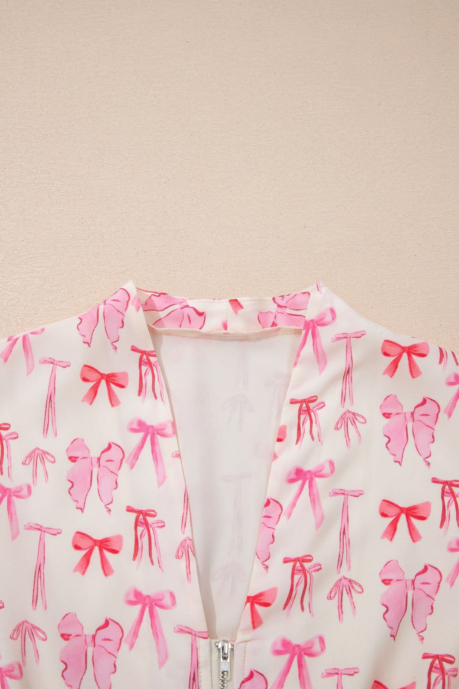 image-Pink Full Zip Cinched Waist Sleeveless Bow Mini Dress