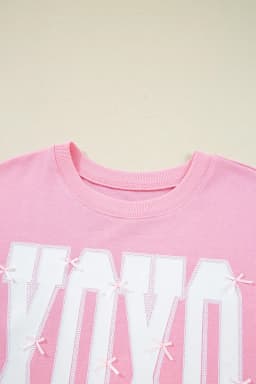 image-Pink Bow Sequin XOXO Letter Graphic Exposed Seam Baggy Sweatshirt