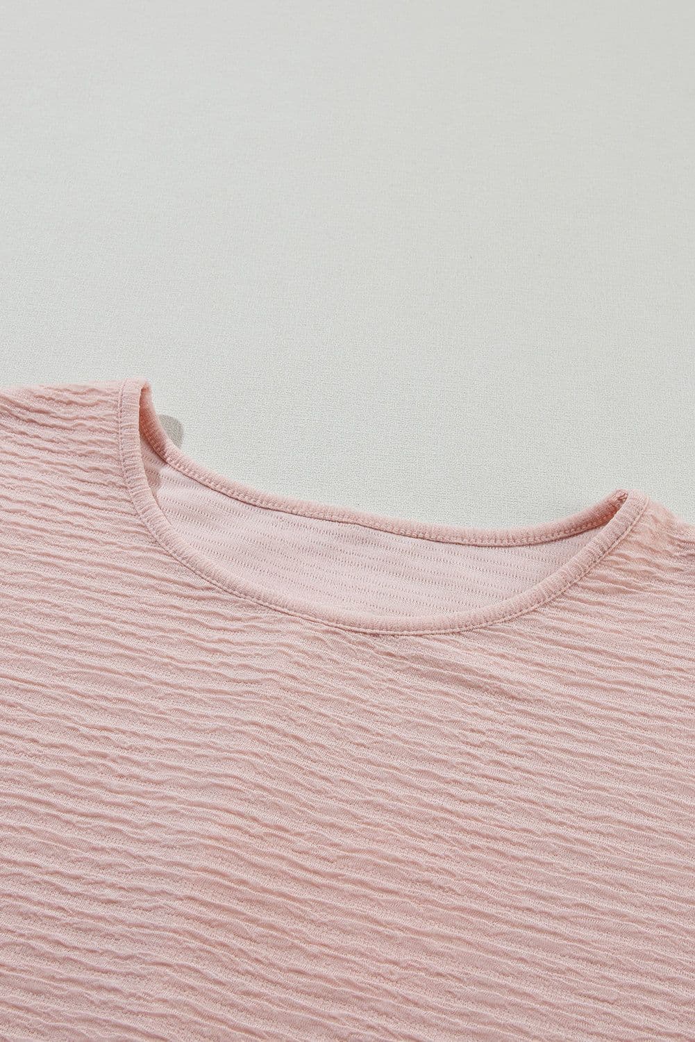 image-Light Pink Ruffled Short Sleeve Blouse - Solid Texture Elegant Design
