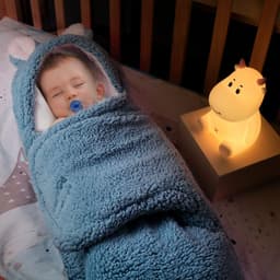 image-Baby's Anti-shock Wrapped In Sleeping Bag Swaddled By Baby