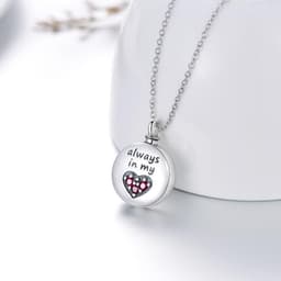 image-Heart Urn Engraved Cremation Necklace for Ashes in Sterling Silver
