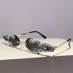 image-KAMMPT New Stylish Fire Shaped Sunglasses for Ladies Rhinestones Fashion Vintage Shades Retro Outdoor Men Brand Design Eyewear