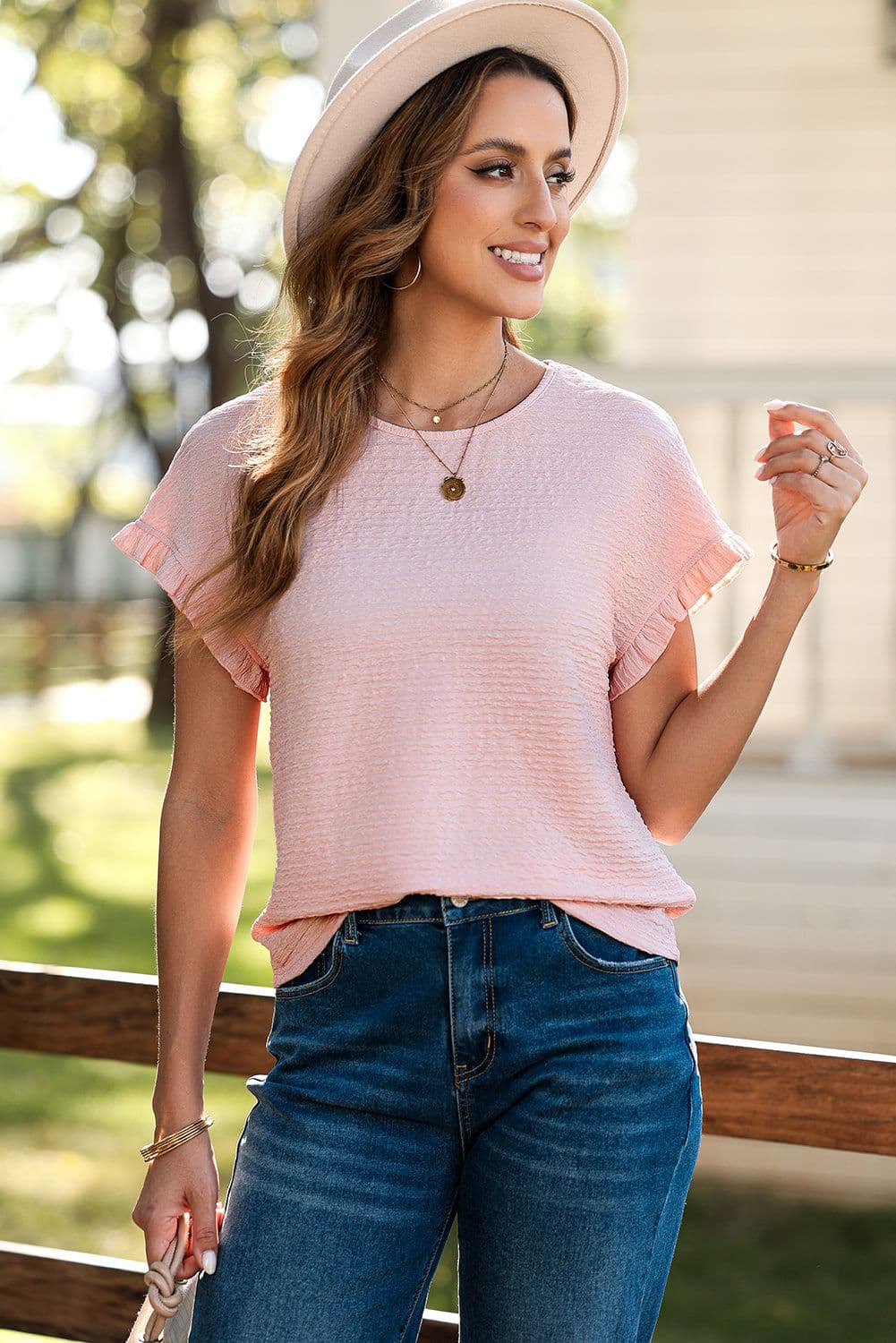 image-Light Pink Ruffled Short Sleeve Blouse - Solid Texture Elegant Design