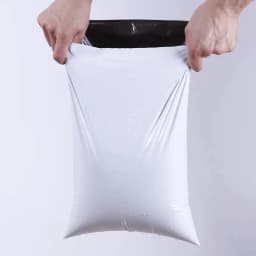 image-50pcs/LEnvelope ots White Courier Bag ExStorage press Bags Mail Bag Mailing Bags Self Adhesive Seal Plastic Packaging Pouch