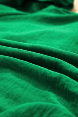 image-Dark Green Peplum Top - Ruched Waist Tied Back