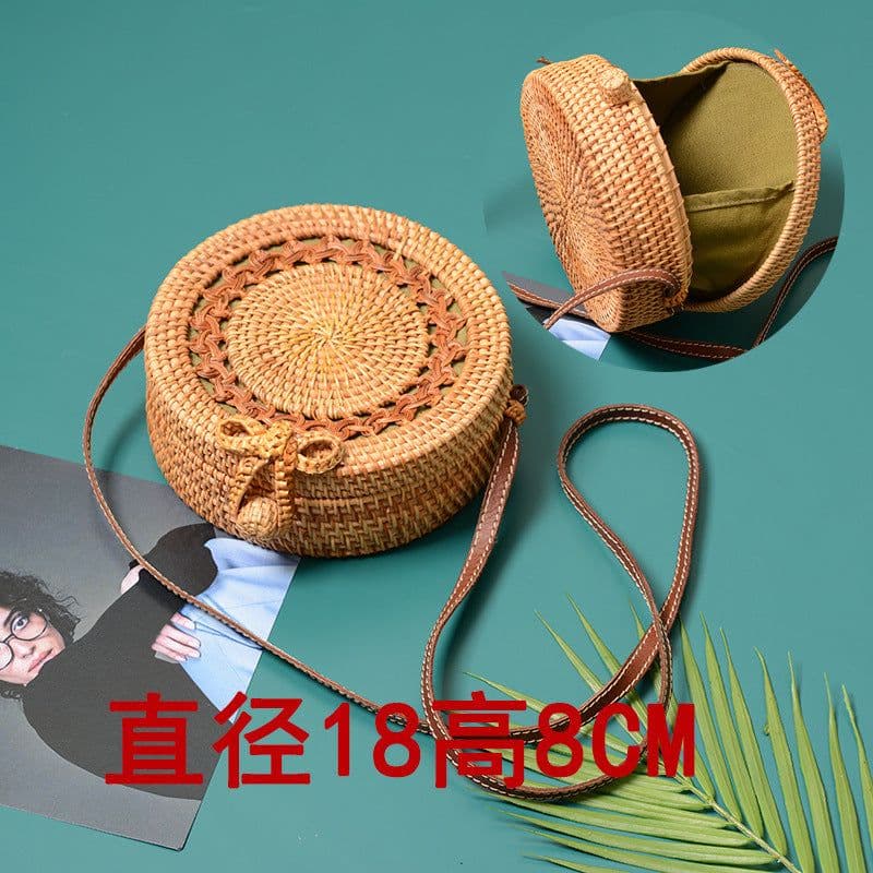 image-Handmade Rattan Woven Round Bag 20cm Hollow Straw Crossbody Bag