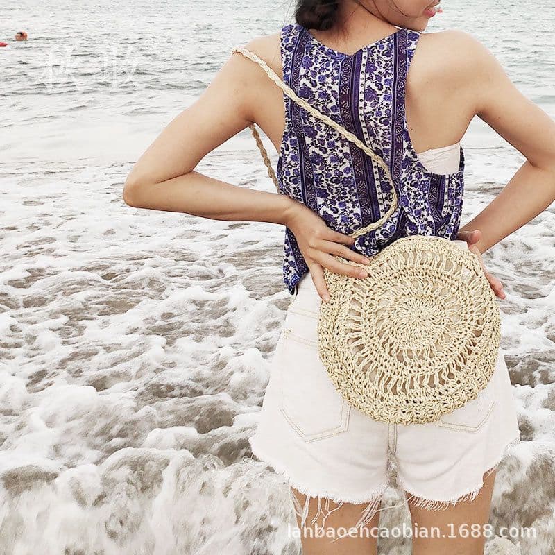 image-Handmade Round Straw Woven Crossbody Bag with Tassel