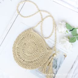 image-Handmade Round Straw Woven Crossbody Bag with Tassel